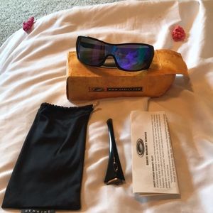 Oakley Riddle Violet Iridescent sunglasses.